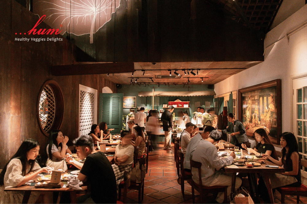 Hum Signature features a nature-inspired atmosphere with a lush garden and wooden interiors that offer a sense of peace and relaxation (Source: Hum - Healthy Veggies Delights)